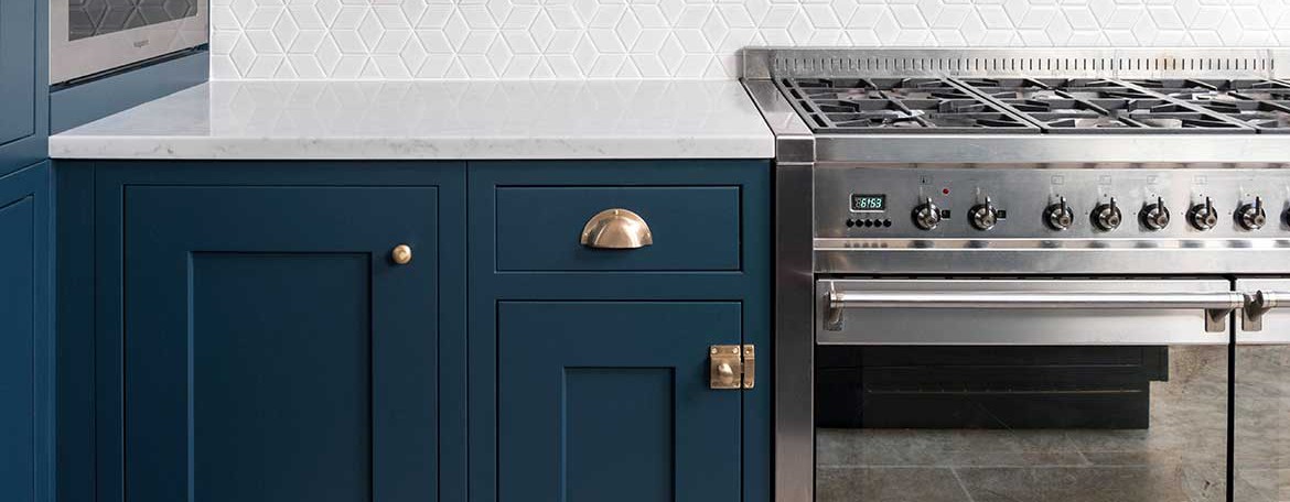 Bespoke kitchen cabinets in a bold blue colour