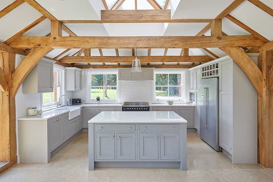 Large kitchen island in shaker style by Chiddingfold Kitchens
